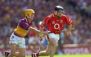 15 August 2004; Ben O'Connor, Cork, in action against Rory McCarthy, Wexford. Guinness Senior Hurling Championship Semi-Final, Wexford v Cork, Croke Park, Dublin. Picture credit; Ray McManus / SPORTSFILE