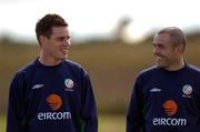 15 August 2004; Republic of Ireland, Steve Finnan and Stephen Carr, right, who did not take part in training today at Malahide FC, Malahide, Co. Dublin. Picture credit; Matt Browne / SPORTSFILE