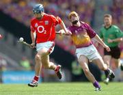15 August 2004; Tom Kenny, Cork, in action against Eoin Quigley, Wexford. Guinness Senior Hurling Championship Semi-Final, Wexford v Cork, Croke Park, Dublin. Picture credit; David Maher / SPORTSFILE