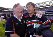 15 August 2004; Donal O' Grady, right, Cork manager, celebrates with county board Chairman Jim Forbes at the end of the game after victory over Wexford. Guinness Senior Hurling Championship Semi-Final, Wexford v Cork, Croke Park, Dublin. Picture credit; David Maher / SPORTSFILE