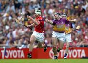 15 August 2004; Niall McCarthy, Cork, in action against Declan Ruth, Wexford. Guinness Senior Hurling Championship Semi-Final, Wexford v Cork, Croke Park, Dublin. Picture credit; Ray McManus / SPORTSFILE