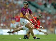 15 August 2004; Ben O'Connor, Cork, in action against Declan Ruth, Wexford. Guinness Senior Hurling Championship Semi-Final, Wexford v Cork, Croke Park, Dublin. Picture credit; David Maher / SPORTSFILE