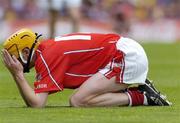 15 August 2004; A dejected Cathal Naughtan, Cork, after defeat to Galway. Minor Hurling Championship Semi-Final, Galway v Cork, Croke Park, Dublin. Picture credit; Ray McManus / SPORTSFILE