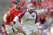 15 August 2004; Mark Herlihy, Galway, under pressure from Eoin Murphy, Cork. Minor Hurling Championship Semi-Final, Galway v Cork, Croke Park, Dublin. Picture credit; Ray McManus / SPORTSFILE