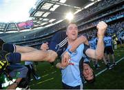 22 September 2013; Dublin's Paddy Andrews celebrates with team-mate Michael Darragh MacAuley after the match. GAA Football All-Ireland Senior Championship Final, Dublin v Mayo, Croke Park, Dublin. Picture credit: Brian Lawless / SPORTSFILE
