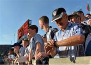 22 September 2013; A general view of a Dublin supporter on Hill 16 checking his watch near the end of the game. GAA Football All-Ireland Championship Finals, Croke Park, Dublin. Picture credit: Barry Cregg / SPORTSFILE