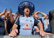 22 September 2013; Dublin supporter Paul McCarthy, from Ashbourne, Co. Meath, cheers on his side from Hill 16 during the GAA Football All-Ireland Championship Finals, Croke Park, Dublin. Picture credit: Barry Cregg / SPORTSFILE