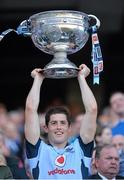 22 September 2013; Dublin's Rory O'Carroll lifts the Sam Maguire Cup following their victory. GAA Football All-Ireland Senior Championship Final, Dublin v Mayo, Croke Park, Dublin. Picture credit: Stephen McCarthy / SPORTSFILE
