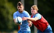 31 July 2024; Ross Byrne, left, and Casper Gabriel during a Leinster rugby training session at UCD in Dublin. Photo by Ramsey Cardy/Sportsfile