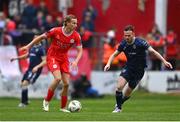 5 August 2024; Harry Wood of Shelbourne in action against Cameron Dummigan of Derry City during the SSE Airtricity Men's Premier Division match between Shelbourne and Derry City at Tolka Park in Dublin. Photo by Tyler Miller/Sportsfile