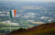 5 August 2024; The Irish tri-colour flutters in the strong winds before the 2024 M. Donnelly GAA All-Ireland Poc Fada Finals at Annaverna Mountain in the Cooley Peninsula, Ravensdale, Louth. Photo by Ben McShane/Sportsfile