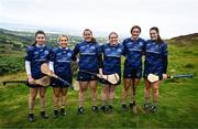 5 August 2024; Senior camogie players, from left, Anna Kearney of Cork, Ciarrai Devlin of Armagh, Eimear Reynolds of Offaly, Susan Earner of Galway, Ellen Casey of Clare and Molly Lynch of Cork before the 2024 M. Donnelly GAA All-Ireland Poc Fada Finals at Annaverna Mountain in the Cooley Peninsula, Ravensdale, Louth. Photo by Ben McShane/Sportsfile