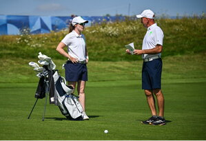 6 August 2024; Leona Maguire of Team Ireland and caddie Verners Tess on the 18th during a practice round at Le Golf National during the 2024 Paris Summer Olympic Games in Paris, France. Photo by David Fitzgerald/Sportsfile