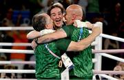 6 August 2024; Kellie Harrington of Team Ireland celebrates with coaches Zaur Antia and Damian Kennedy after defeating Wenlu Yang of Team People's Republic of China in their women's 60kg final bout at Court Philippe-Chatrier in Roland Garros Stadium during the 2024 Paris Summer Olympic Games in Paris, France. Photo by Brendan Moran/Sportsfile