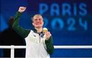 6 August 2024; Kellie Harrington of Team Ireland celebrates with her gold medal after defeating Wenlu Yang of Team People's Republic of China in their women's 60kg final bout at Court Philippe-Chatrier in Roland Garros Stadium during the 2024 Paris Summer Olympic Games in Paris, France. Photo by David Fitzgerald/Sportsfile