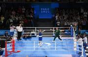 6 August 2024; Kellie Harrington of Team Ireland celebrates with head coach Zaur Antia after defeating Wenlu Yang of Team People's Republic of China in their women's 60kg final bout at Court Philippe-Chatrier in Roland Garros Stadium during the 2024 Paris Summer Olympic Games in Paris, France. Photo by Stephen McCarthy/Sportsfile