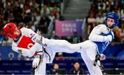 7 August 2024; Jack Woolley of Team Ireland, right, in action against Gashim Magomedov of Team Azerbaijan during the men's -58kg round of 16 at the Grand Palais during the 2024 Paris Summer Olympic Games in Paris, France. Photo by Stephen McCarthy/Sportsfile
