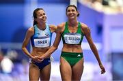 7 August 2024; Sophie O’Sullivan of Team Ireland, right, with Daniely Joselyn Brea of Team Venezuela, after finishing fourth in her women's 1500m repechage at the Stade de France during the 2024 Paris Summer Olympic Games in Paris, France. Photo by Sam Barnes/Sportsfile