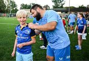 6 August 2024; Rabah Slimani signs autographs during a Leinster Rugby open training session at Lansdowne FC in Dublin. Photo by Harry Murphy/Sportsfile