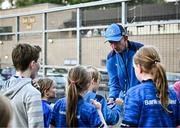 6 August 2024; Head coach Leo Cullen signs autographs during a Leinster Rugby open training session at Lansdowne FC in Dublin. Photo by Harry Murphy/Sportsfile