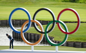 7 August 2024; Celine Boutier of Team France putts for a birdie on the fifteenth green during round one of the women's individual strokeplay at Le Golf National during the 2024 Paris Summer Olympic Games in Paris, France. Photo by Brendan Moran/Sportsfile