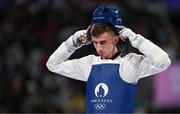 7 August 2024; Jack Woolley of Team Ireland reacts after his defeat against Adrian Vincente Yunta of Team Spain during the men's -58kg Repechage at the Grand Palais during the 2024 Paris Summer Olympic Games in Paris, France. Photo by Stephen McCarthy/Sportsfile