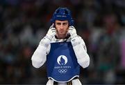 7 August 2024; Jack Woolley of Team Ireland reacts after his defeat against Adrian Vincente Yunta of Team Spain during the men's -58kg Repechage at the Grand Palais during the 2024 Paris Summer Olympic Games in Paris, France. Photo by Stephen McCarthy/Sportsfile