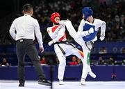 7 August 2024; Jack Woolley of Team Ireland, right, in action against Adrian Vincente Yunta of Team Spain during the men's -58kg Repechage at the Grand Palais during the 2024 Paris Summer Olympic Games in Paris, France. Photo by Stephen McCarthy/Sportsfile
