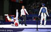 7 August 2024; Jack Woolley of Team Ireland, right, in action against Adrian Vincente Yunta of Team Spain during the men's -58kg Repechage at the Grand Palais during the 2024 Paris Summer Olympic Games in Paris, France. Photo by Stephen McCarthy/Sportsfile