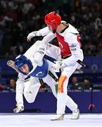 7 August 2024; Jack Woolley of Team Ireland, left, in action against Adrian Vincente Yunta of Team Spain during the men's -58kg Repechage at the Grand Palais during the 2024 Paris Summer Olympic Games in Paris, France. Photo by Stephen McCarthy/Sportsfile