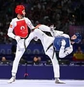 7 August 2024; Jack Woolley of Team Ireland, right, in action against Adrian Vincente Yunta of Team Spain during the men's -58kg Repechage at the Grand Palais during the 2024 Paris Summer Olympic Games in Paris, France. Photo by Stephen McCarthy/Sportsfile