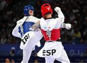 7 August 2024; Jack Woolley of Team Ireland, left, in action against Adrian Vincente Yunta of Team Spain during the men's -58kg Repechage at the Grand Palais during the 2024 Paris Summer Olympic Games in Paris, France. Photo by Stephen McCarthy/Sportsfile