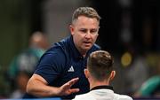 7 August 2024; Team Ireland taekwondo coach Robert Taaffe, speaks to Jack Woolley of Team Ireland after his men's 59kg Repecage match against Adrian Vincente Yunta of Team Spain at the Grand Palais during the 2024 Paris Summer Olympic Games in Paris, France. Photo by Stephen McCarthy/Sportsfile
