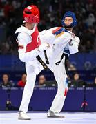 7 August 2024; Yohandri Granado of Team Venezuela, left, in action against Cyrian Ravet of Team France during the men's -58kg Repechage at the Grand Palais during the 2024 Paris Summer Olympic Games in Paris, France. Photo by Stephen McCarthy/Sportsfile