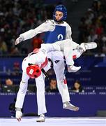 7 August 2024; Yohandri Granado of Team Venezuela, left, in action against Cyrian Ravet of Team France during the men's -58kg Repechage at the Grand Palais during the 2024 Paris Summer Olympic Games in Paris, France. Photo by Stephen McCarthy/Sportsfile