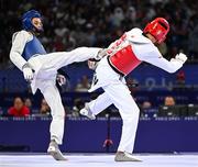 7 August 2024; Cyrian Ravet of Team France, left, in action against Yohandri Granado of Team Venezuela during the men's -58kg Repechage at the Grand Palais during the 2024 Paris Summer Olympic Games in Paris, France. Photo by Stephen McCarthy/Sportsfile