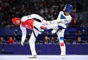 7 August 2024; Yohandri Granado of Team Venezuela, left, in action against Cyrian Ravet of Team France during the men's -58kg Repechage at the Grand Palais during the 2024 Paris Summer Olympic Games in Paris, France. Photo by Stephen McCarthy/Sportsfile