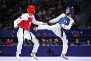 7 August 2024; Yohandri Granado of Team Venezuela, left, in action against Cyrian Ravet of Team France during the men's -58kg Repechage at the Grand Palais during the 2024 Paris Summer Olympic Games in Paris, France. Photo by Stephen McCarthy/Sportsfile