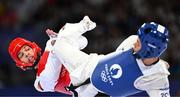 7 August 2024; Yohandri Granado of Team Venezuela, left, in action against Cyrian Ravet of Team France during the men's -58kg Repechage at the Grand Palais during the 2024 Paris Summer Olympic Games in Paris, France. Photo by Stephen McCarthy/Sportsfile