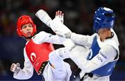 7 August 2024; Yohandri Granado of Team Venezuela, left, in action against Cyrian Ravet of Team France during the men's -58kg Repechage at the Grand Palais during the 2024 Paris Summer Olympic Games in Paris, France. Photo by Stephen McCarthy/Sportsfile