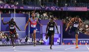 7 August 2024; Quincy Hall of Team USA, second from left, crosses the finish line to win the men's 400m final at the Stade de France during the 2024 Paris Summer Olympic Games in Paris, France. Photo by Sam Barnes/Sportsfile