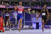 7 August 2024; Quincy Hall of Team USA, centre, celebrates after winning the men's 400m final at the Stade de France during the 2024 Paris Summer Olympic Games in Paris, France. Photo by Sam Barnes/Sportsfile