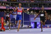 7 August 2024; Quincy Hall of Team USA, centre, celebrates after winning the men's 400m final at the Stade de France during the 2024 Paris Summer Olympic Games in Paris, France. Photo by Sam Barnes/Sportsfile