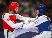 8 August 2024; Chaima Toumi of Team Tunisia, left, in action against Faith Dillon of Team United States during the women's -57kg round of 16 at the Grand Palais during the 2024 Paris Summer Olympic Games in Paris, France. Photo by Stephen McCarthy/Sportsfile