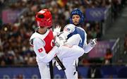 8 August 2024; Faith Dillon of Team United States, right, in action against Chaima Toumi of Team Tunisia during the women's -57kg round of 16 at the Grand Palais during the 2024 Paris Summer Olympic Games in Paris, France. Photo by Stephen McCarthy/Sportsfile