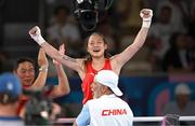8 August 2024; Yuan Chang of Team China celebrates winning gold in her women's 54kg final bout against Hatice Akbas of Team Turkey at Court Philippe-Chatrier in Roland Garros Stadium duringduring the 2024 Paris Summer Olympic Games in Paris, France. Photo by Stephen McCarthy/Sportsfile