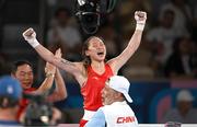 8 August 2024; Yuan Chang of Team China celebrates winning gold in her women's 54kg final bout against Hatice Akbas of Team Turkey at Court Philippe-Chatrier in Roland Garros Stadium duringduring the 2024 Paris Summer Olympic Games in Paris, France. Photo by Stephen McCarthy/Sportsfile