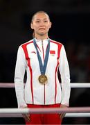8 August 2024; Yuan Chang of Team China with her gold medal at the medal presentation for the women's 54kg at Court Philippe-Chatrier in Roland Garros Stadium during the 2024 Paris Summer Olympic Games in Paris, France. Photo by Stephen McCarthy/Sportsfile