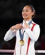 8 August 2024; Yuan Chang of Team China with her gold medal at the medal presentation for the women's 54kg at Court Philippe-Chatrier in Roland Garros Stadium during the 2024 Paris Summer Olympic Games in Paris, France. Photo by Stephen McCarthy/Sportsfile