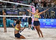 8 August 2024; Duda Lisboa, right, and Ana Patrícia of Team Brazil celebrate after the women's beach volleyball semi final match between Team Brazil and Team Australia at the Eiffel Tower Stadium during the 2024 Paris Summer Olympic Games in Paris, France. Photo by David Fitzgerald/Sportsfile